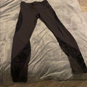 Lululemon black leggings with floral mesh detail